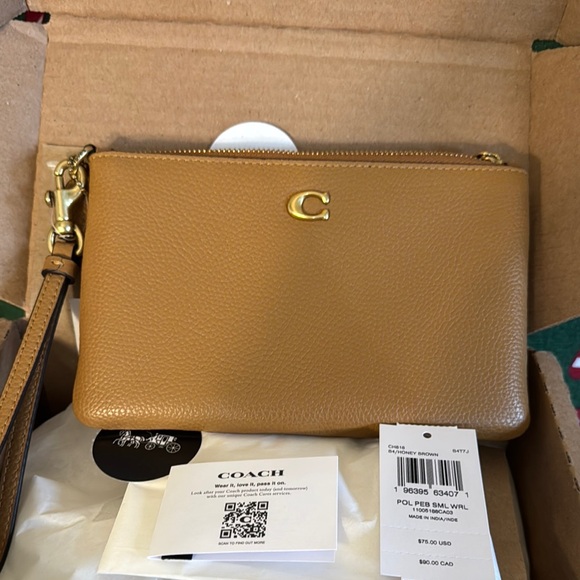 Coach Handbags - Coach Tan Leather Wristletwith Gold Hardware